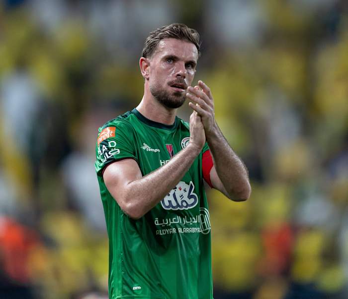 Jordan Henderson pictured applauding Al-Ettifaq fans after a game against Al Nassr in October 2023